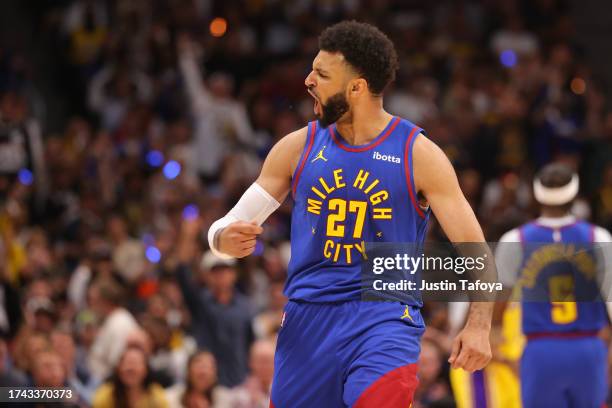 Jamal Murray of the Denver Nuggets celebrates after a basket against the Los Angeles Lakers in the first half of the NBA Opening Night game at Ball...