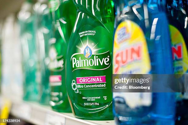 Bottles of Colgate-Palmolive Co. Palmolive brand dishwashing liquid are displayed for sale on a supermarket shelf in Princeton, Illinois, U.S., on...