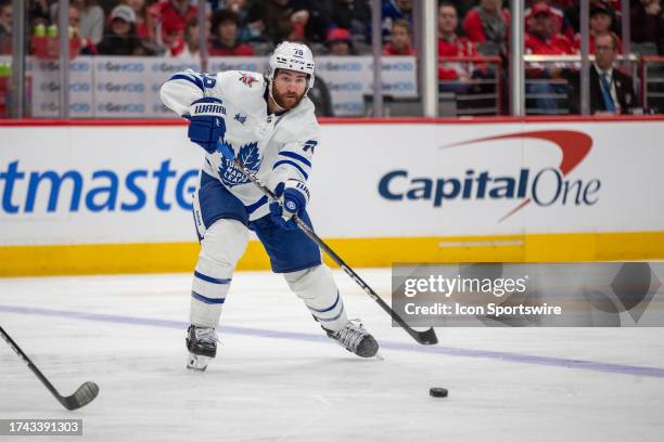 Toronto Maple Leafs defenseman TJ Brodie passes the puke during the game between the Toronto Maple Leafs and the Washington Capitals on October 24 at...