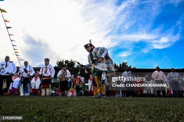 Indigenous peoples of the Americas dance and perform rituals as they attend a cultural meeting at the Comanche Nation fairgrounds in Lawton, Oklahoma...