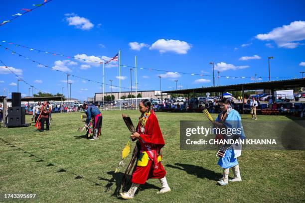 Indigenous peoples of the Americas dance and perform rituals as they attend a cultural meeting at the Comanche Nation fairgrounds in Lawton, Oklahoma...