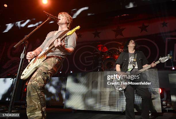 John Rzeznik and Robby Takac of Goo Goo Dolls perform in support of the bands' Magnetic release at Sleep Train Pavilion on July 23, 2013 in Concord,...