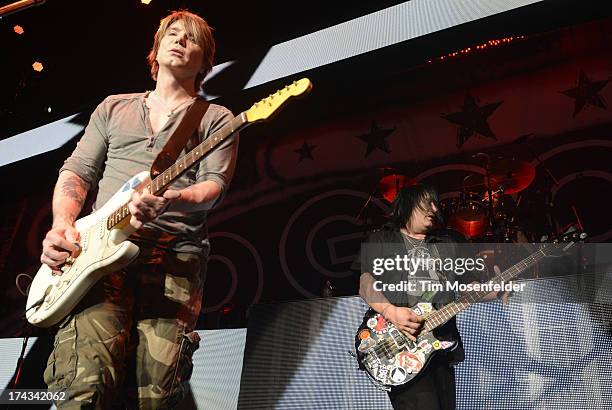 John Rzeznik and Robby Takac of Goo Goo Dolls perform in support of the bands' Magnetic release at Sleep Train Pavilion on July 23, 2013 in Concord,...