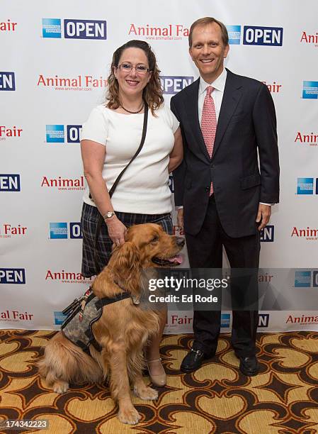 Melissa Maher, Chauncey and John Ingram attends AnimalFair.com Bark Breakfast Benefiting K9s For Warriors at the Loews Vanderbilt Hotel on July 24,...