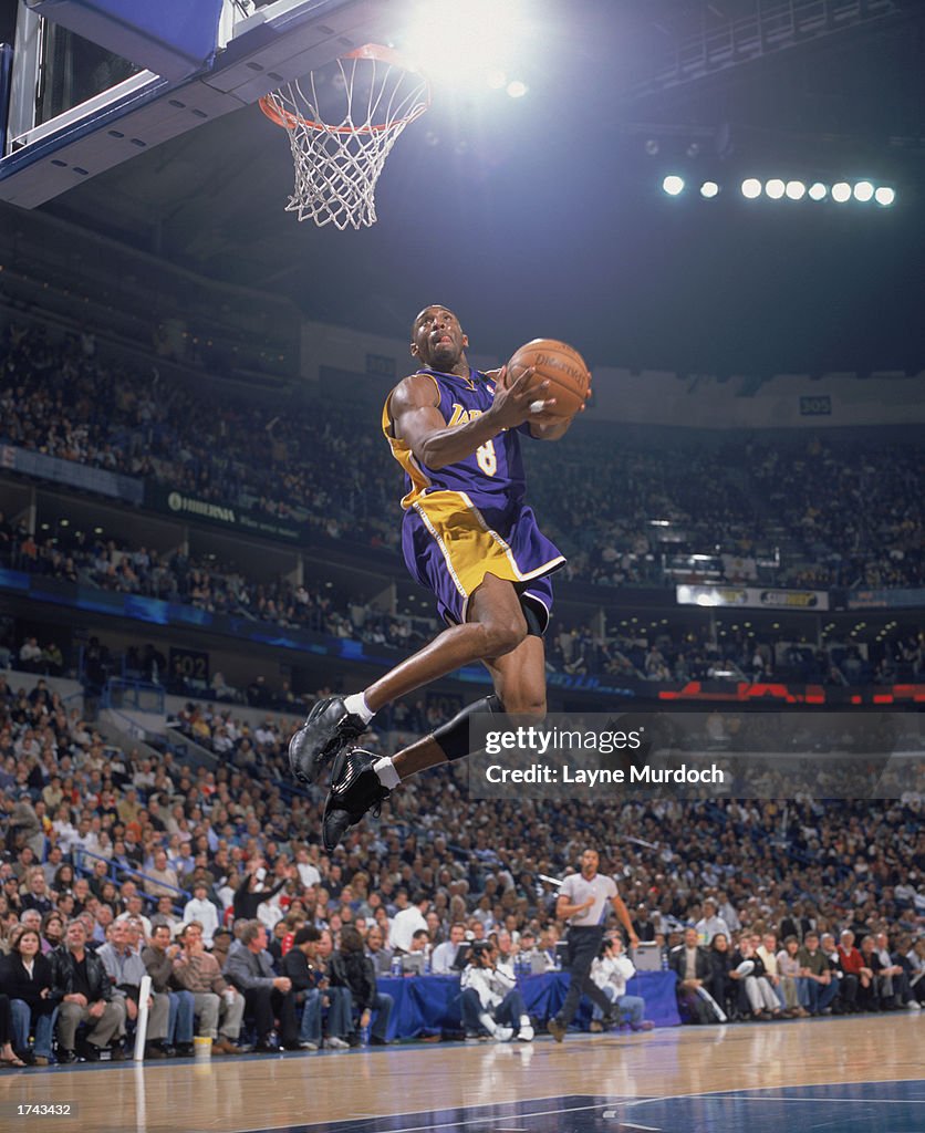 Kobe Bryant goes up with the ball