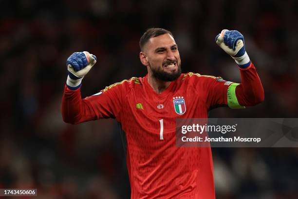 Gianluigi Donnarumma of Italy celebrates after team mate Gianluca Scamacca scored to give the visitors a 1-0 lead during the UEFA EURO 2024 European...
