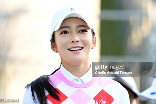 Ji yu Jung of South Korea smiles on the 10th tee during the first round of NOBUTA Group Masters GC Ladies at Masters Golf Club on October 19, 2023 in...