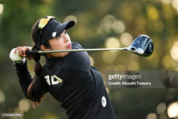 Haruka Amamoto of Japan hits her tee shot on the 10th hole during the first round of NOBUTA Group Masters GC Ladies at Masters Golf Club on October...