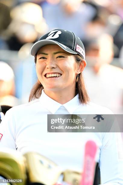 Ayaka Watanabe of Japan smiles on the 10th tee during the first round of NOBUTA Group Masters GC Ladies at Masters Golf Club on October 19, 2023 in...