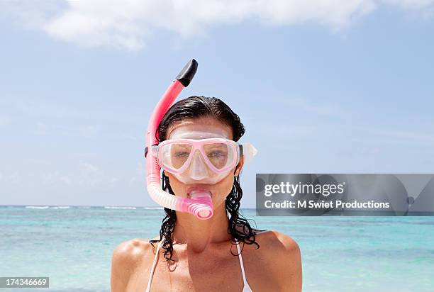 woman with snorkel and mask - schnorchel stock-fotos und bilder