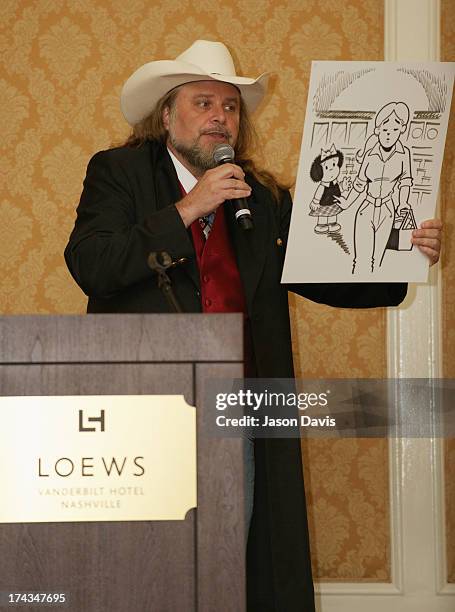 Cartoonist Guy Gilchrist speaks at the AnimalFair.com Bark Breakfast Benefiting K9s For Warriors at the Loews Vanderbilt Hotel on July 24, 2013 in...