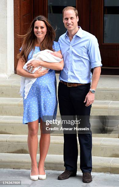 Prince William, Duke of Cambridge and Catherine, Duchess of Cambridge with their newborn son pose for the media before departing the Lindo Wing of St...