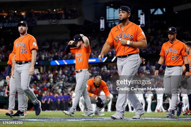 Justin Verlander, Kyle Tucker, Jose Abreu and Michael Brantley of the Houston Astros walk on the field prior to Game Three of the American League...