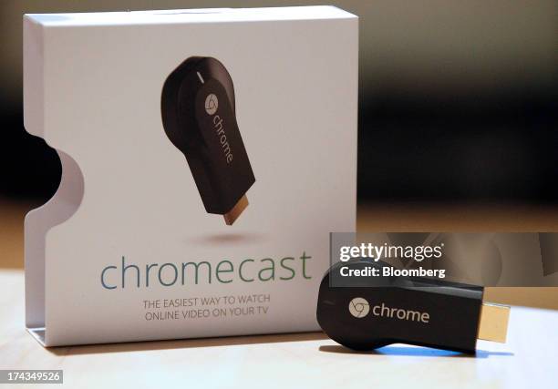 The new Google ChromeCast is displayed for a photograph during an event in San Francisco, California, U.S., on Wednesday, July 24, 2013. Google Inc.,...