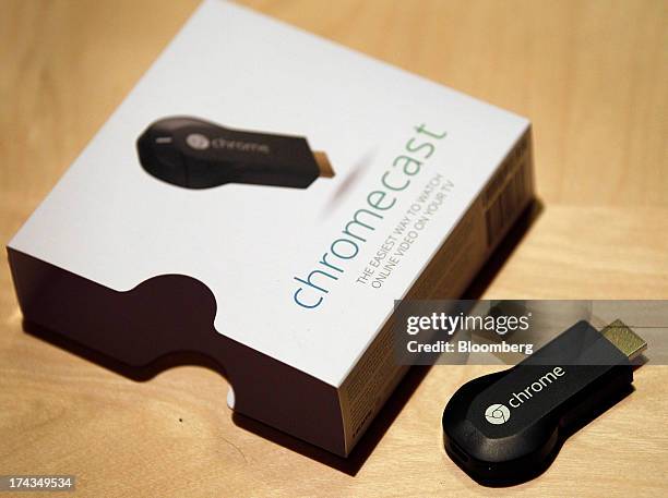 The new Google ChromeCast is displayed for a photograph during an event in San Francisco, California, U.S., on Wednesday, July 24, 2013. Google Inc.,...