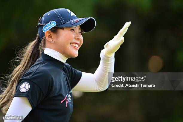 Yuri Yoshida of Japan smiles on the 10th hole during the first round of NOBUTA Group Masters GC Ladies at Masters Golf Club on October 19, 2023 in...