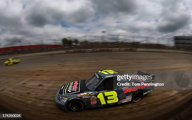 Tracy Hines, drives the SealMaster Toyota, during practice for the NASCAR Camping World Truck Series inaugural Mudsummer Classic at Eldora Speedway...