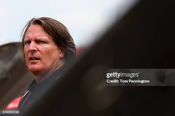 Scott Bloomquist, driver of the ToyotaCare Toyota, prepares for practice for the NASCAR Camping World Truck Series inaugural Mudsummer Classic at...