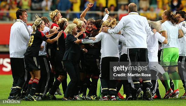 Silvia Neid , head coach of Germany celebrate with her team after the UEFA Women's Euro 2013 semi final match between Sweden and Germany at Gamla...