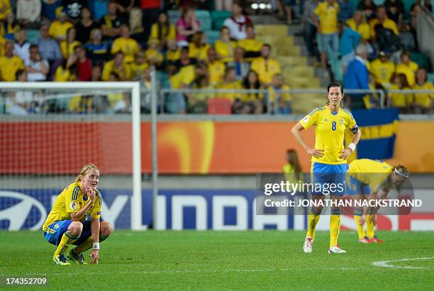 Sweden's players react after loosing the UEFA Women's European Championship Euro 2013 semi final football match Sweden vs Germany on July 24, 2013 in...