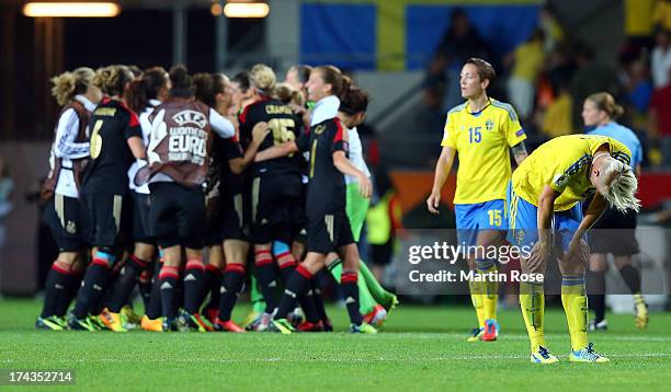 Nilla Fischer of Sweden looks dejected after the UEFA Women's Euro 2013 semi final match between Sweden and Germany at Gamla Ullevi on July 24, 2013...