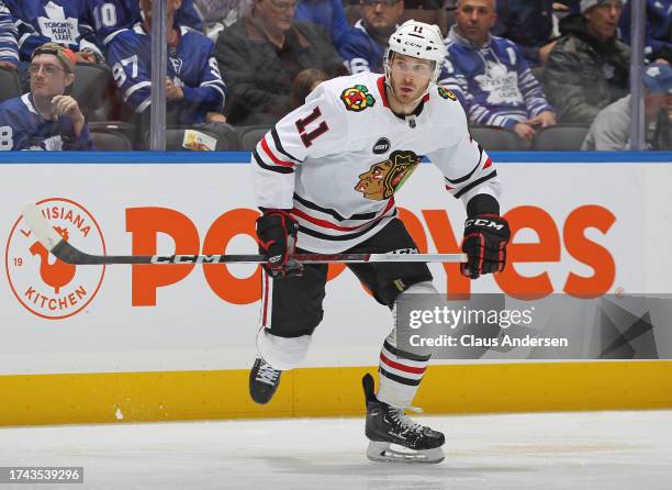 Taylor Raddysh of the Chicago Blackhawks skates against the Toronto Maple Leafs during the third period in an NHL game at Scotiabank Arena on October...