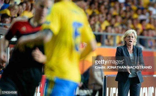 Germany's head coach Silvia Neid reacts during the UEFA Women's European Championship Euro 2013 semi final football match Sweden vs Germany on July...