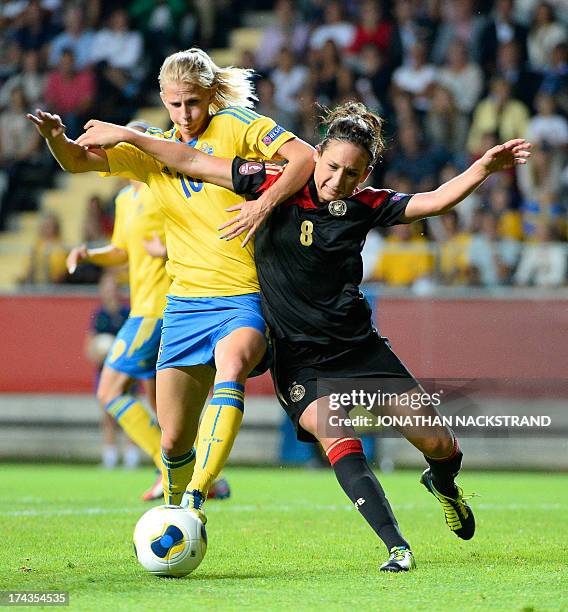 Sweden's forward Sofia Jakobsson and Germany's midfielder Nadine Kessler vie for the ball during the UEFA Women's European Championship Euro 2013...