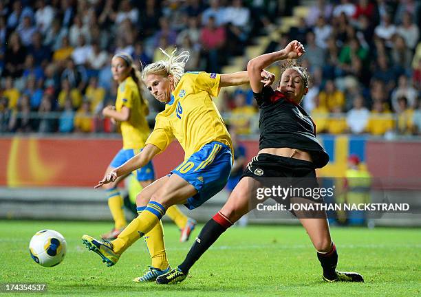 Sweden's forward Sofia Jakobsson and Germany's midfielder Nadine Kessler vie for the ball during the UEFA Women's European Championship Euro 2013...