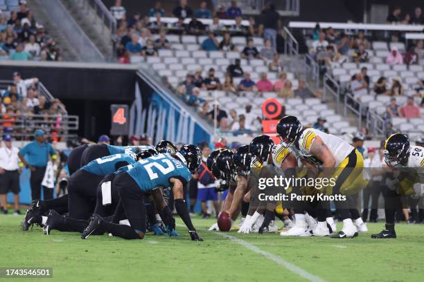 The Pittsburgh Steelers offense lines up against the Jacksonville Jaguars defense during an NFL preseason football game at TIAA Bank Field on August...