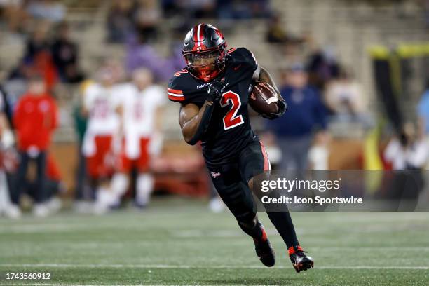 Western Kentucky Hilltoppers running back Davion Ervin-Poindexter runs with the ball during a college football game against the Liberty Flames on...