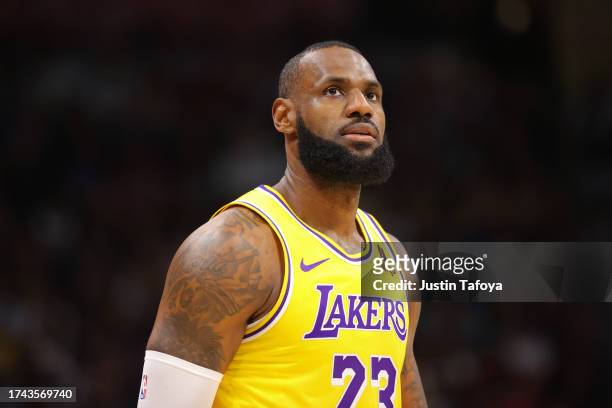 LeBron James of the Los Angeles Lakers looks towards the crowd during a timeout against the Denver Nuggets in the second half of the NBA Opening...