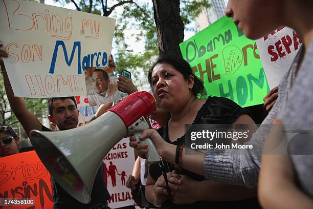 Natalia Mendez protests the detention of her son Marco Saavedra on July 24, 2013 in New York City. Protesters from the New York State Youth...