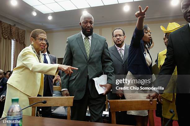 Tracy Martin , father of slain teen Trayvon Martin, arrives at the first hearing of the Congressional Caucus on Black Men and Boys with co-chair Del....