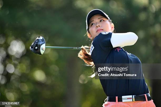 Yuri Yoshida of Japan hits her tee shot on the 15th hole during the first round of NOBUTA Group Masters GC Ladies at Masters Golf Club on October 19,...