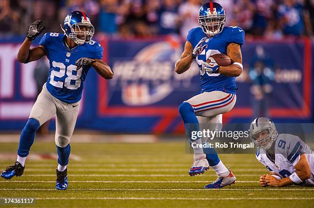 Linebacker Michael Boley of the New York Giants runs the ball after an interception during the game against the Dallas Cowboys at MetLife Stadium on...