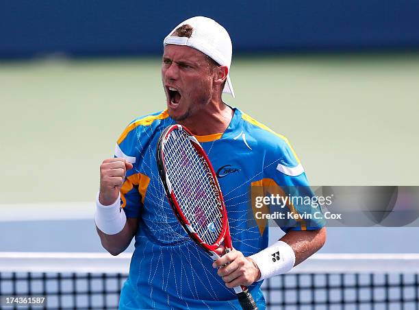 Lleyton Hewit of Australia reacts after winning a point against Rhyne Williams during the BB&T Atlanta Open in Atlantic Station on July 24, 2013 in...