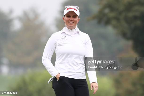 Nanna Koerstz Madsen of Denmark reacts after sinking her putt for eagle on the second green during the first round of the BMW Ladies Championship on...