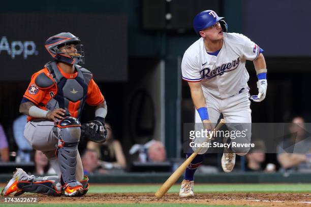 Josh Jung of the Texas Rangers hits a two run home run against Cristian Javier of the Houston Astros during the fifth inning in Game Three of the...