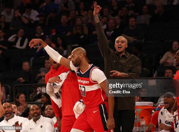 Taj Gibson of the Washington Wizards celebrates his three point shot in the second half against the New York Knicks during a preseason game at...