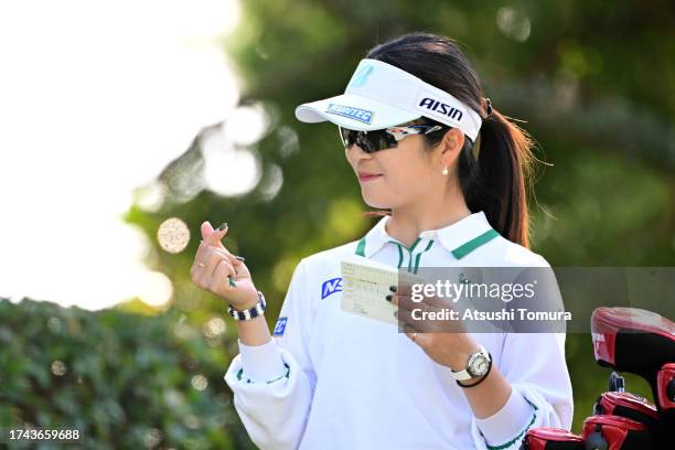 Kana Mikashima of Japan is seen on the 15th tee during the first round of NOBUTA Group Masters GC Ladies at Masters Golf Club on October 19, 2023 in...