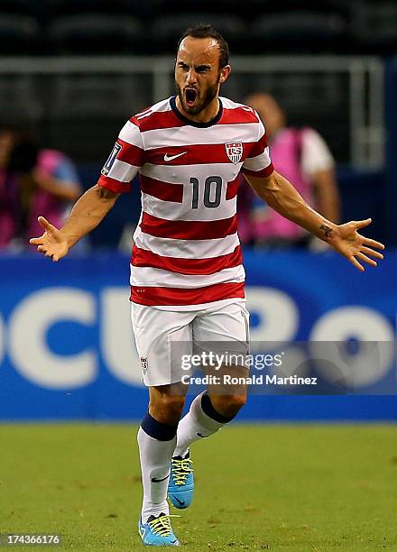 Landon Donovan of the United States celebrates his goal against Honduras during the CONCACAF Gold Cup semifinal match at Cowboys Stadium on July 24,...