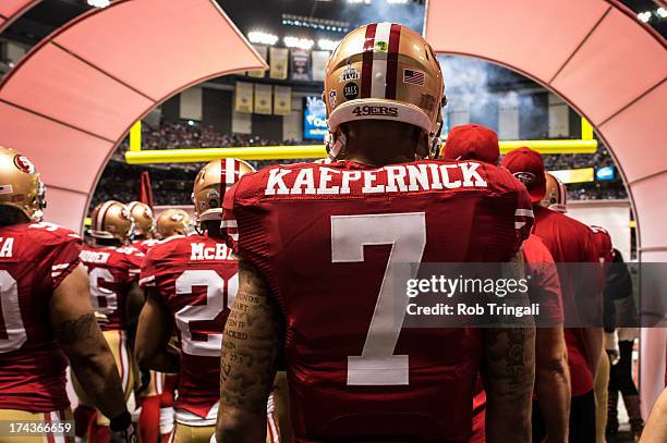 Colin Kaepernick of the San Francisco 49ers looks on from the tunnel before Super Bowl XLVII against the Baltimore Ravens on February 3, 2013 in New...