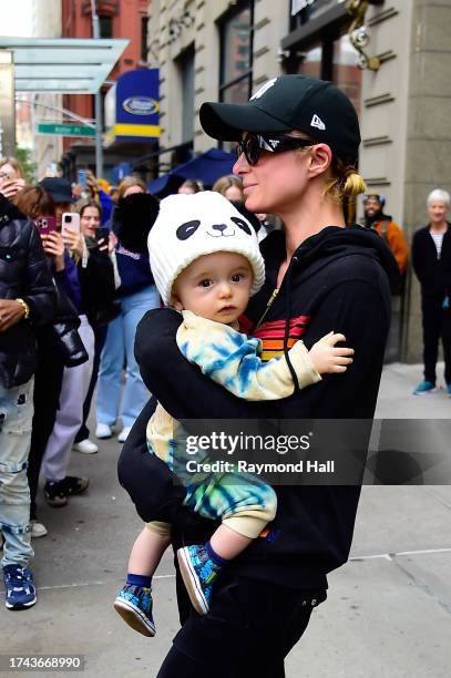 Paris Hilton and Phoenix Barron Hilton Reum are seen in Soho on October 18, 2023 in New York City.