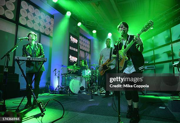 Tegan Rain Quin and Sara Keirsten Quin of the band Tegan And Sara perform during the 2013 MLB FanCave Concert Series at MLB Fan Cave on July 24, 2013...