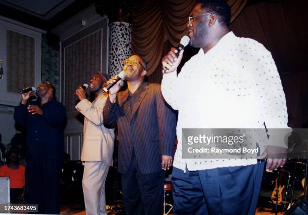 Singers Marvin, Carvin, Michael and Ronald Winans performs during BeBe Winans' album release celebration at The Drake hotel in Chicago, Illinois in...