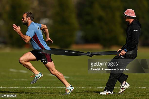 Brett Stewart of the Sea Eagles performs a rehabilitation drill during a Manly Sea Eagles NRL training session at Sydney Academy of Sport on July 25,...