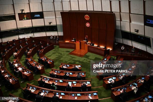 Hong Kong Chief Executive John Lee delivers his annual policy address to the Legislative Council on October 25, 2023.