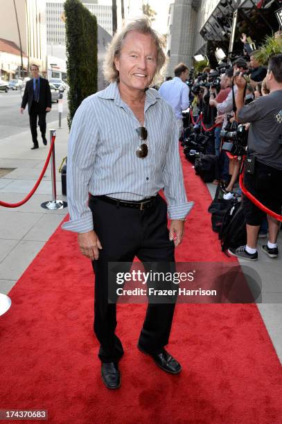 Actor John Savage arrives at the premiere of "Blue Jasmine" hosted by AFI & Sony Picture Classics at AMPAS Samuel Goldwyn Theater on July 24, 2013 in...