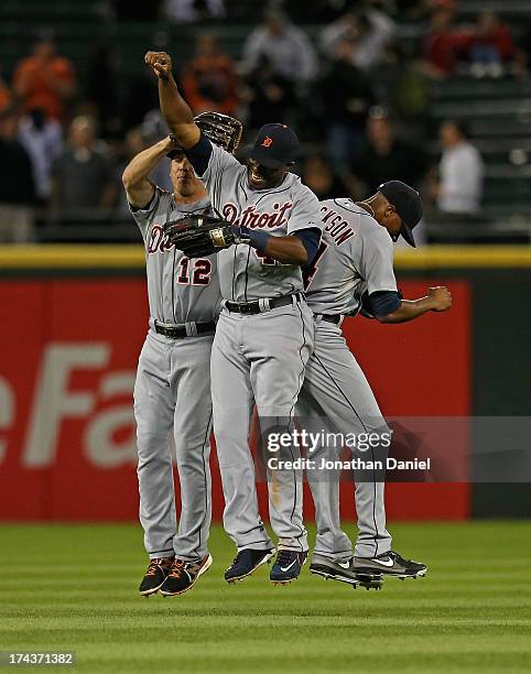 Andy Dirks, Torii Hunter and Austin Jackson of the Detroit Tigers celebrate a win over the Chicago White Sox at U.S. Cellular Field on July 24, 2013...